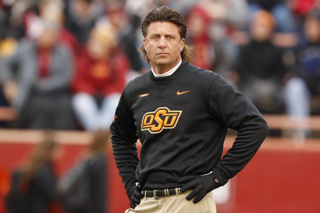 Mike Gundy Wisconsin vs Oklahoma State prediction odds college football betting picks Guaranteed Rate Bowl game predictions