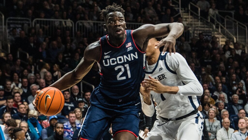 Adama Sanogo UConn vs Saint Mary's prediction NCAA Tournament bracketology March Madness expert picks college basketball betting odds